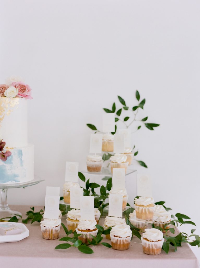Floral-Filled Wedding Inspiration | Cupcake Seating Chart | Bella Belle Shoes with Blush and Pink Roses | Sami Kathryn Photography | Dallas DFW Wedding Photographer